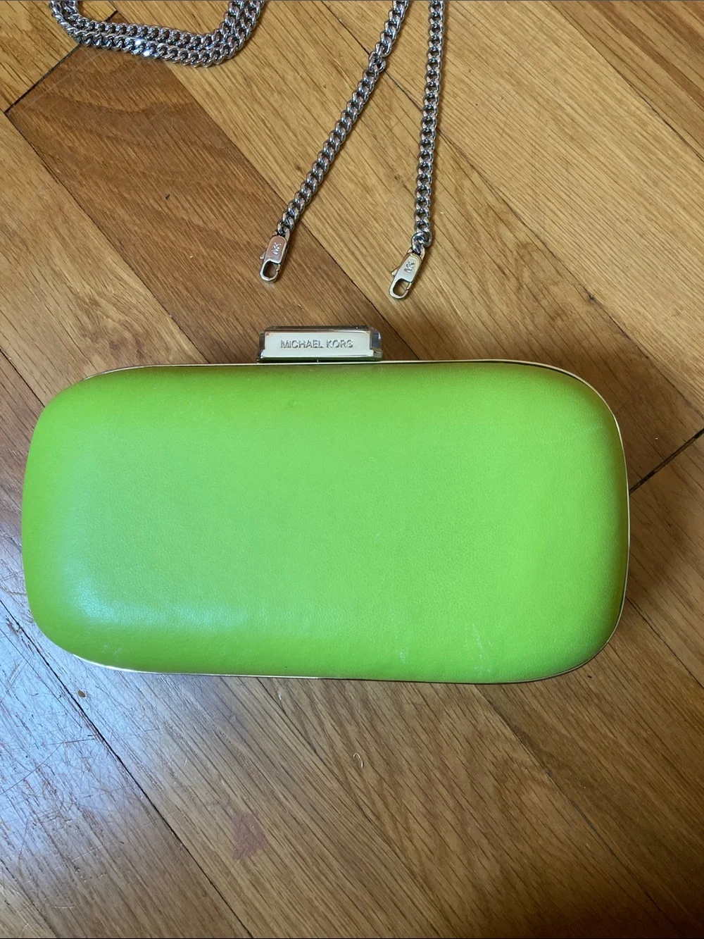 Michael Kors Lime Green Chain Strap Clutch with white bag protector